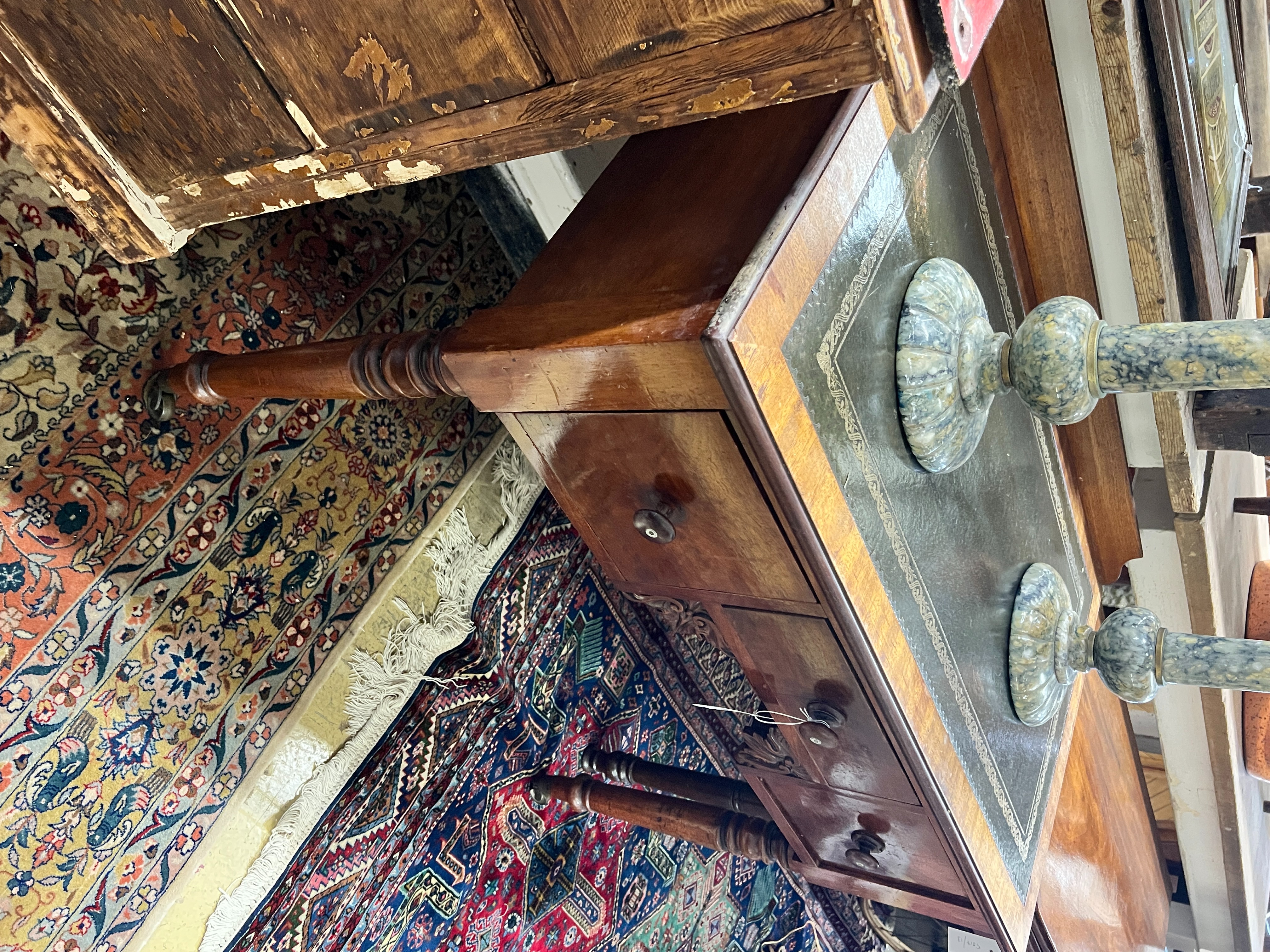 An early Victorian mahogany kneehole writing table, width 91cm, depth 53cm, height 75cm